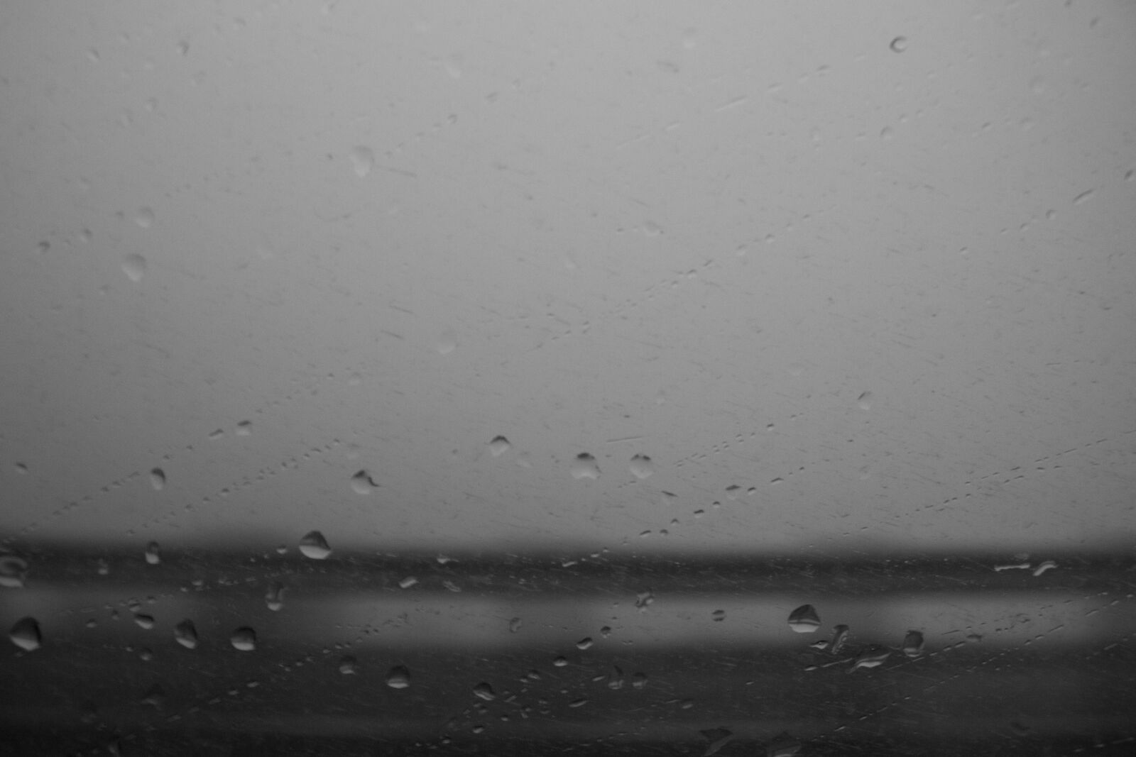 Canon EOS 700D (EOS Rebel T5i / EOS Kiss X7i) sample photo. Car, window, driving, droplets photography
