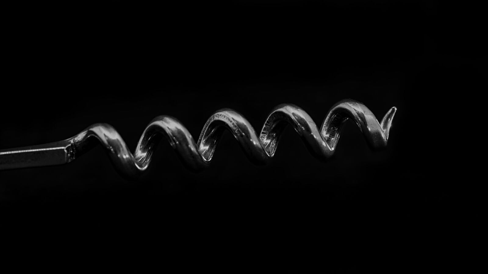Nikon D3400 sample photo. Corkscrew, metal, black background photography