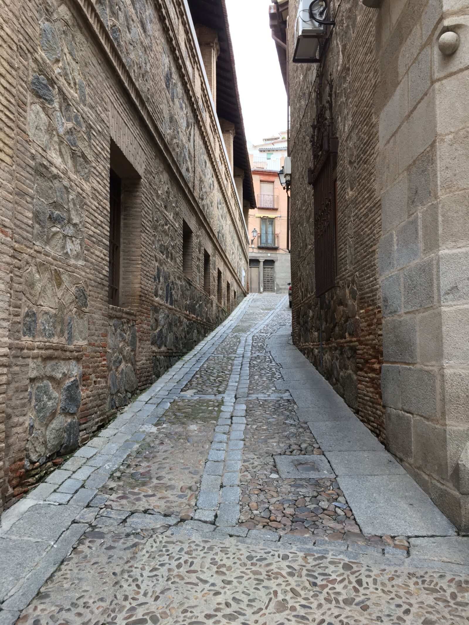 Apple iPhone 6s sample photo. Alley, toledo, architecture photography