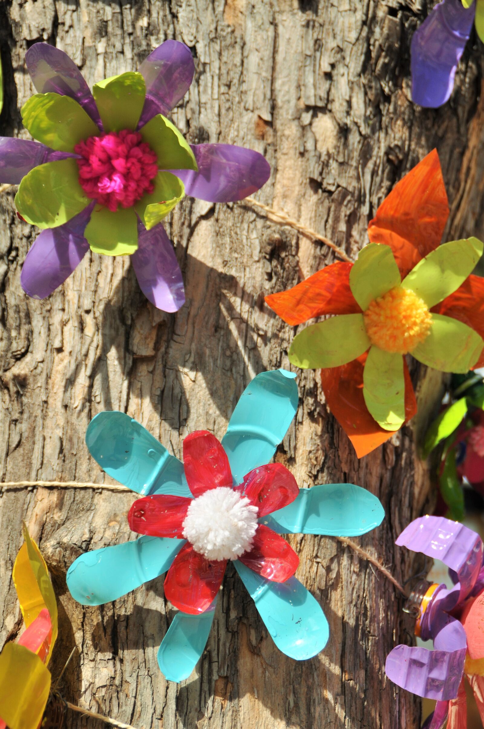 Nikon D5000 sample photo. Upcycling, plastic, flower photography
