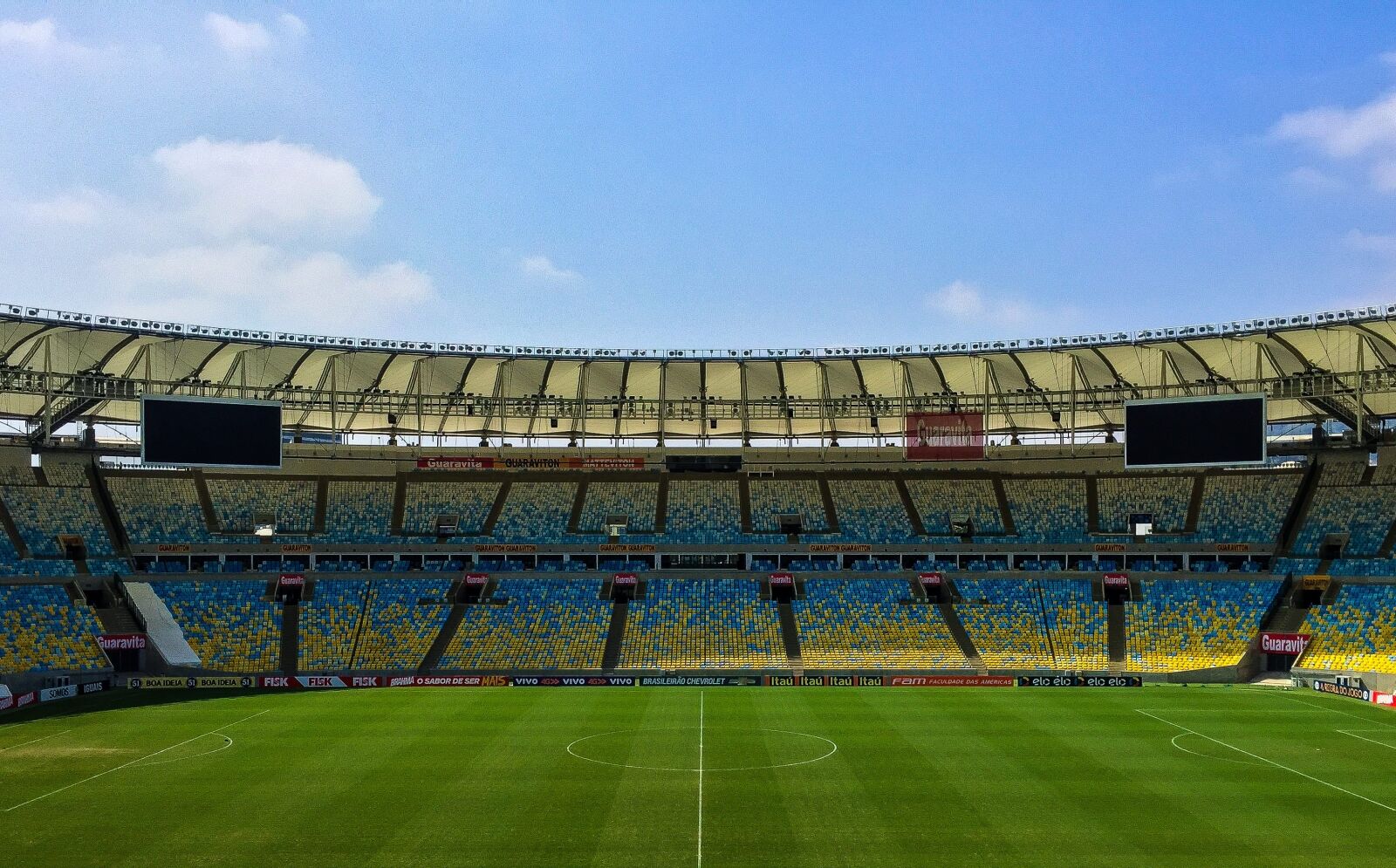 Apple iPhone 6 sample photo. Bleachers, soccer field, stadium photography
