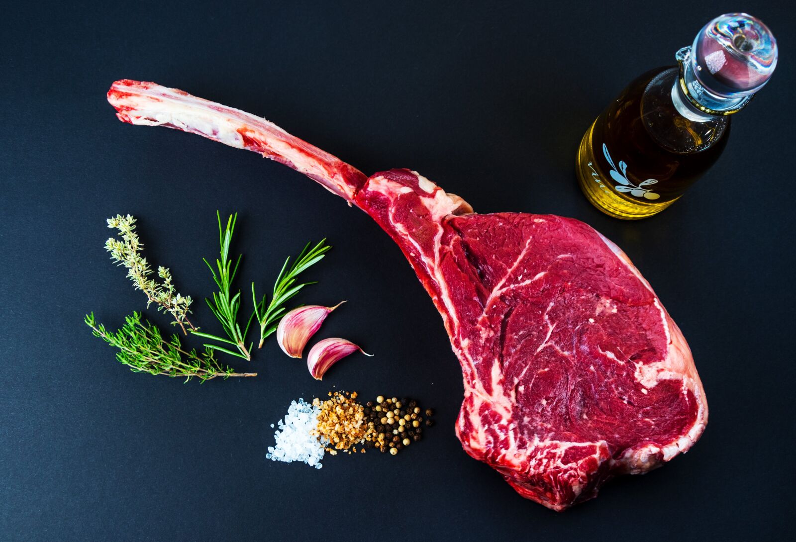 Canon EF-S 18-135mm F3.5-5.6 IS USM sample photo. Food, steak, tomahawk steak photography