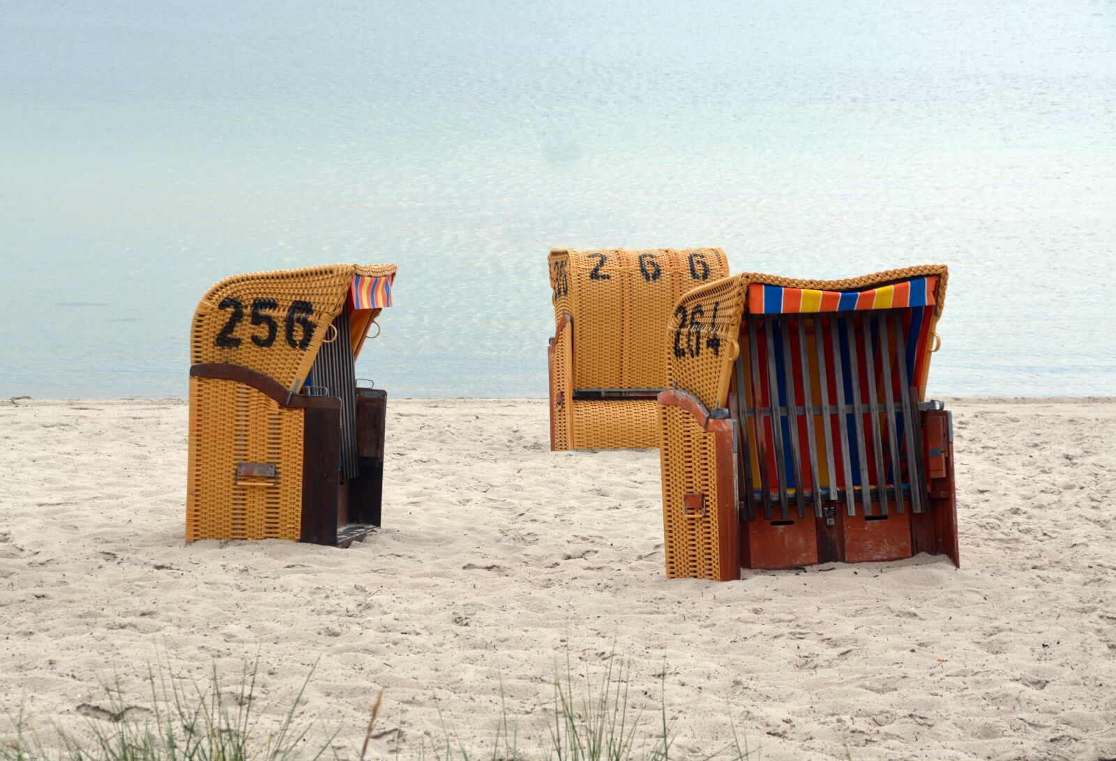 Nikon D5200 sample photo. Beach chair, coast, sea photography