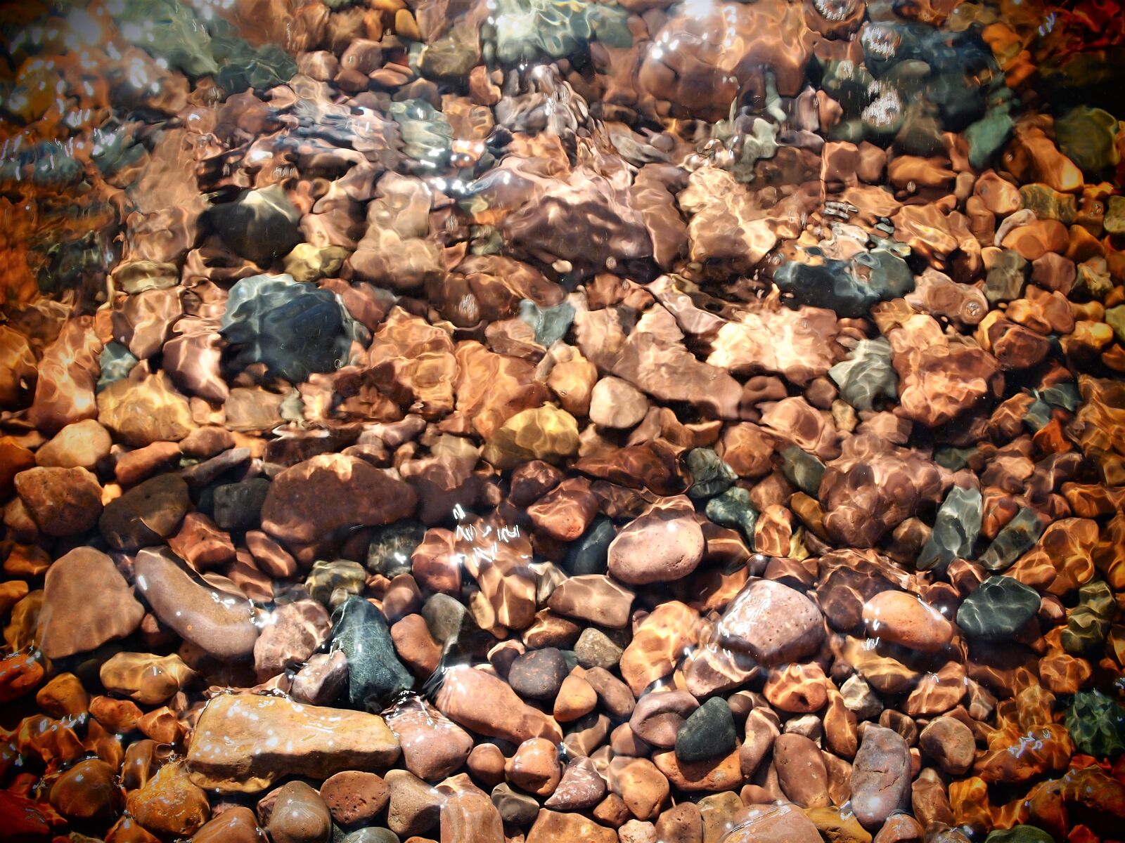 Olympus M.Zuiko Digital ED 14-42mm F3.5-5.6 L sample photo. Lake, pebble, beach, pebbles photography