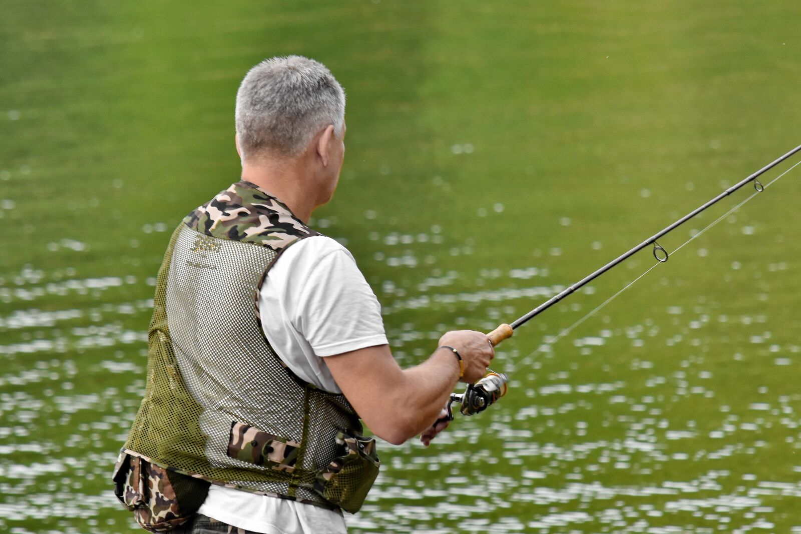 Nikon D5500 sample photo. Fisherman, fishing gear, fly photography