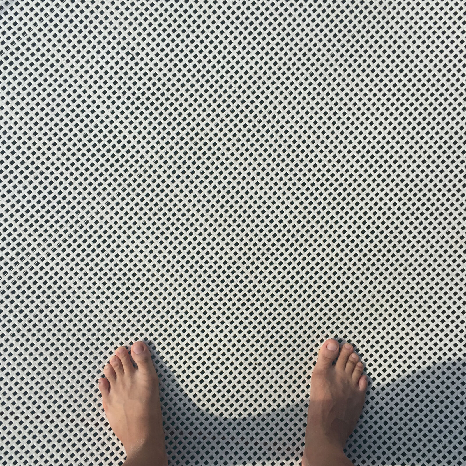 iPhone 6 back camera 4.15mm f/2.2 sample photo. Person, s, feet photography