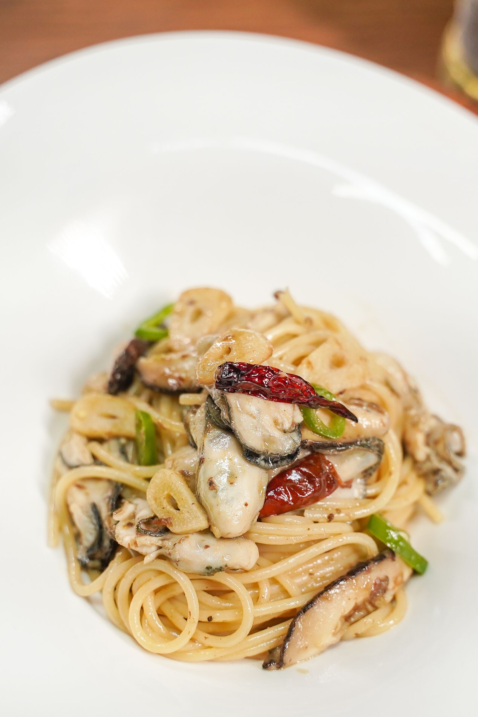 Sony a7 III + Tamron 28-75mm F2.8 Di III RXD sample photo. Oyster, pasta, anchovies photography
