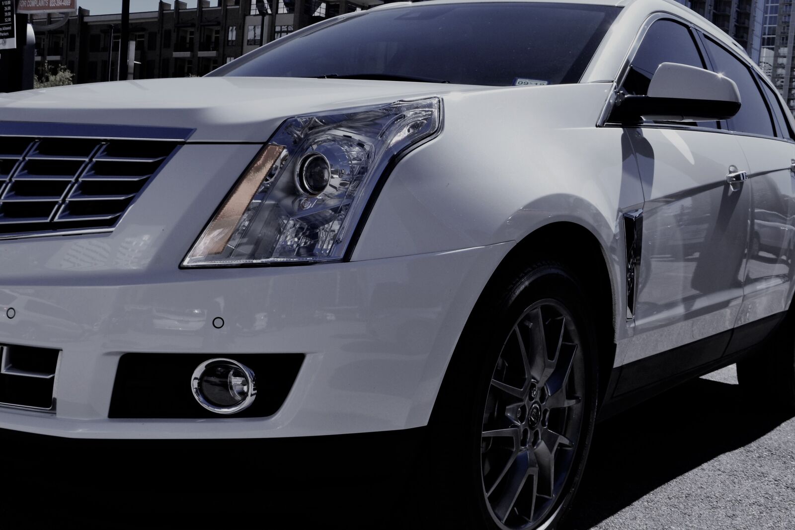 Nikon D3100 sample photo. Headlamp, cadillac, suv photography