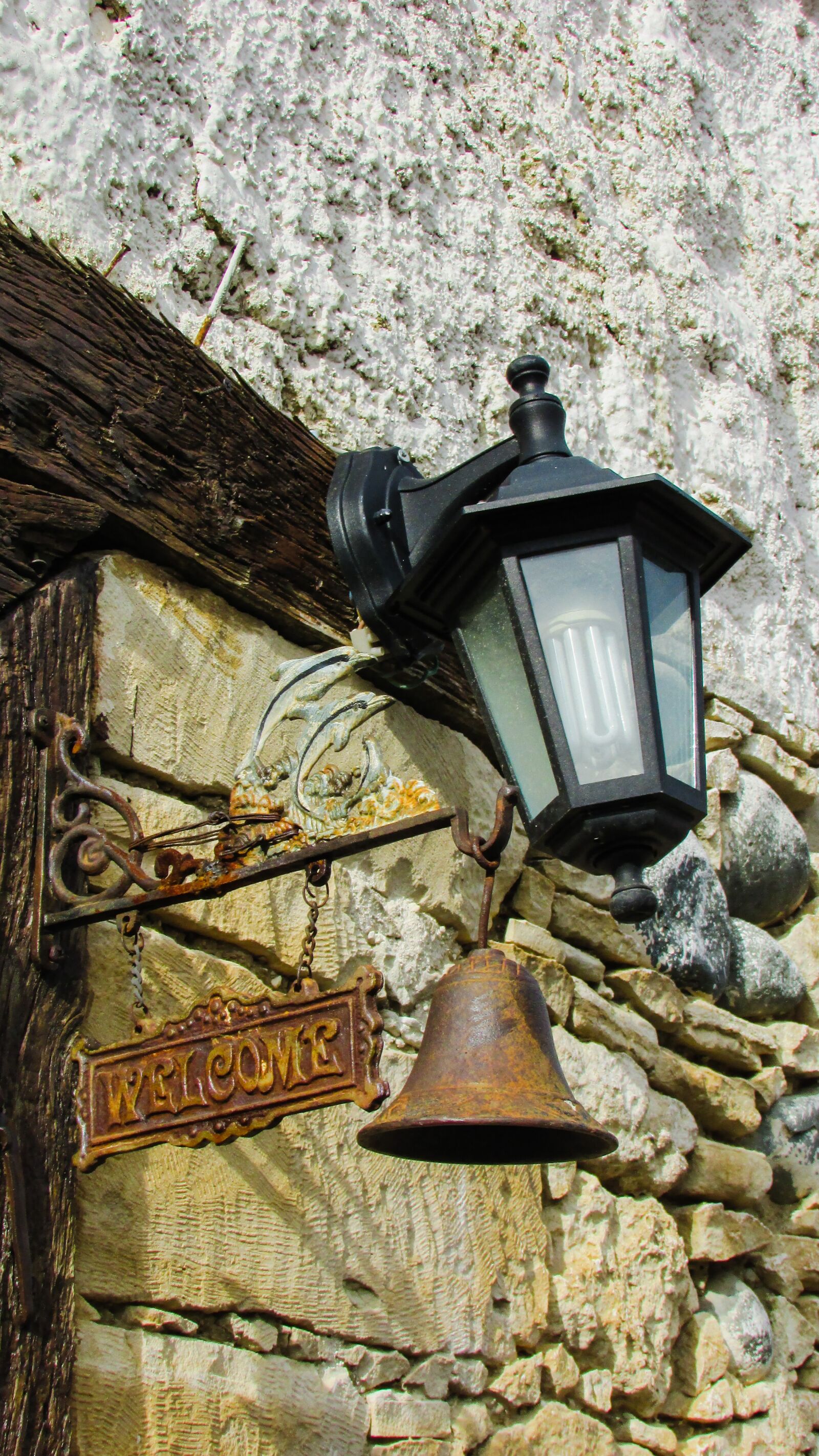Canon PowerShot SX400 IS sample photo. Welcome sign, sign, bell photography