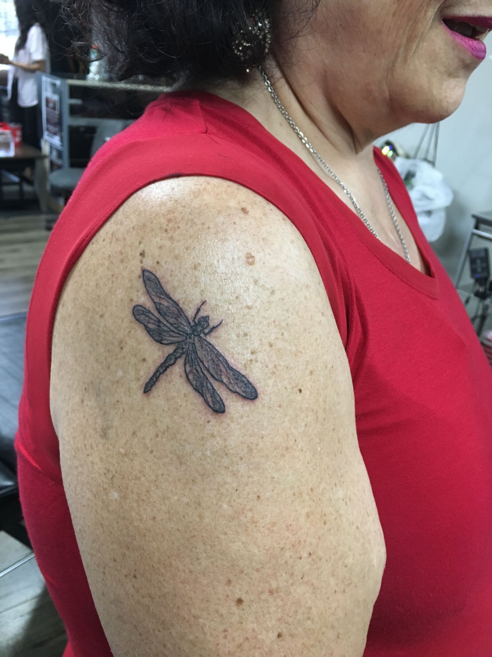 Apple iPhone 6s sample photo. Tattoo, firefly, luck photography