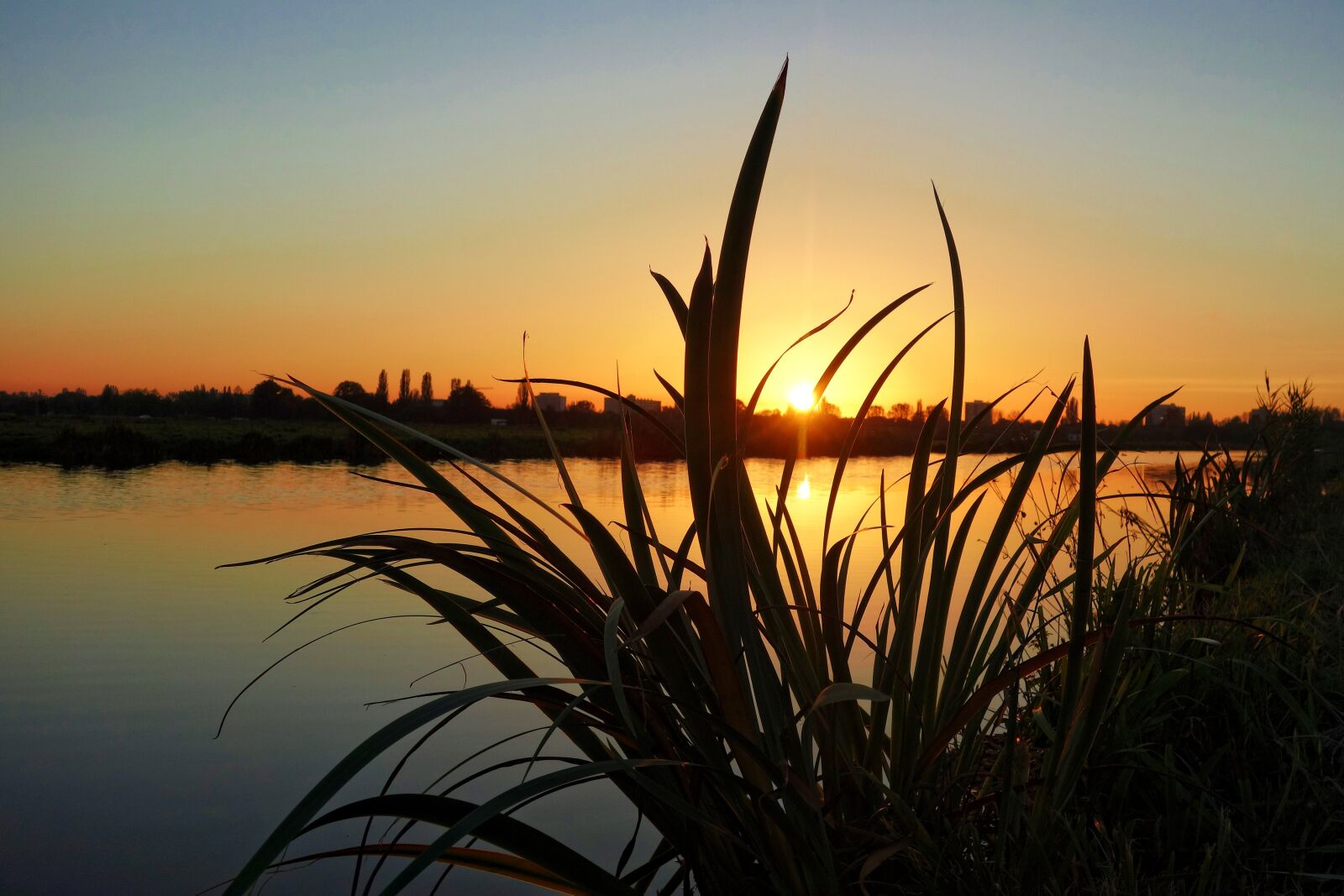 Sony Cyber-shot DSC-RX100 sample photo. Sunset, waterway, silhouette photography