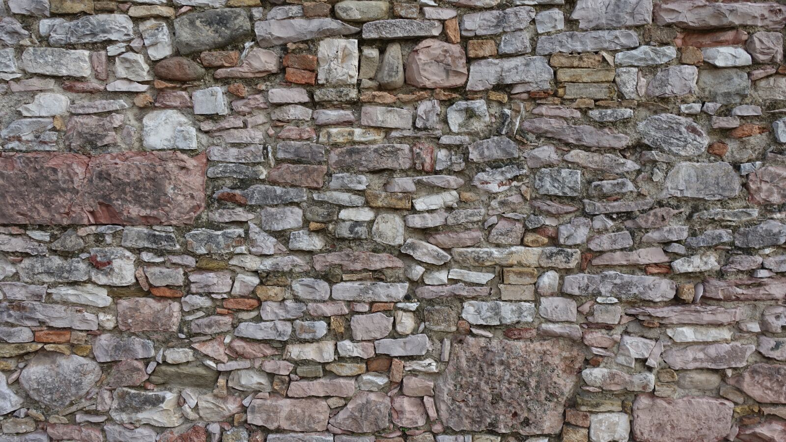 Sony Cyber-shot DSC-RX100 IV sample photo. Symbol, stones, wall photography