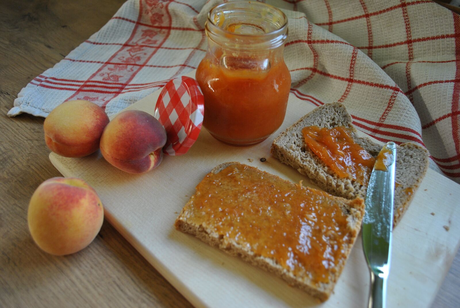 Nikon D3000 sample photo. Peach, jam, food photography