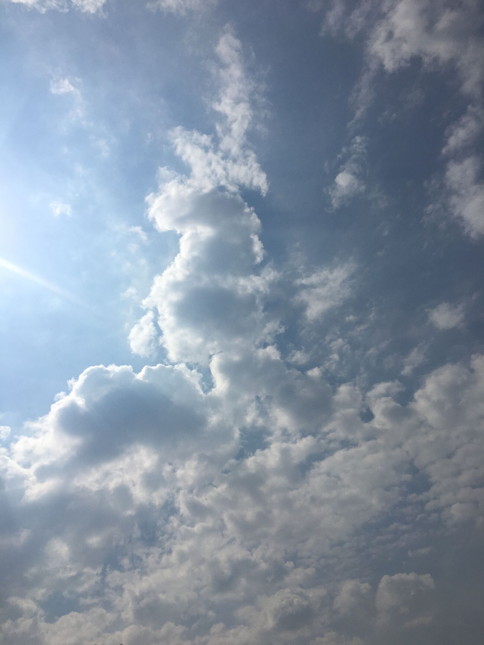 Apple iPhone 6s sample photo. Clouds, sun, sky photography
