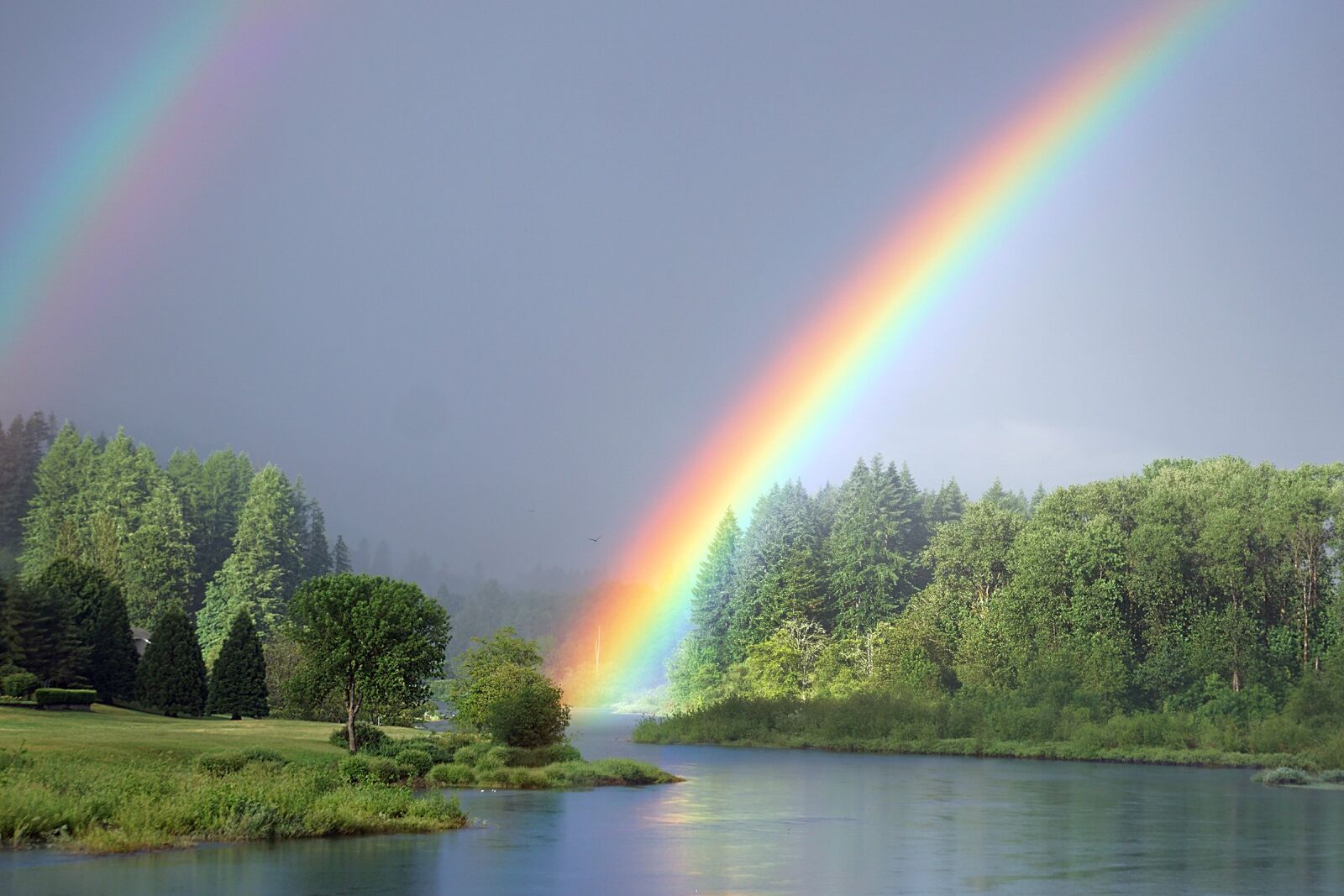 Sony E 55-210mm F4.5-6.3 OSS sample photo. Rainbow, river, nature photography