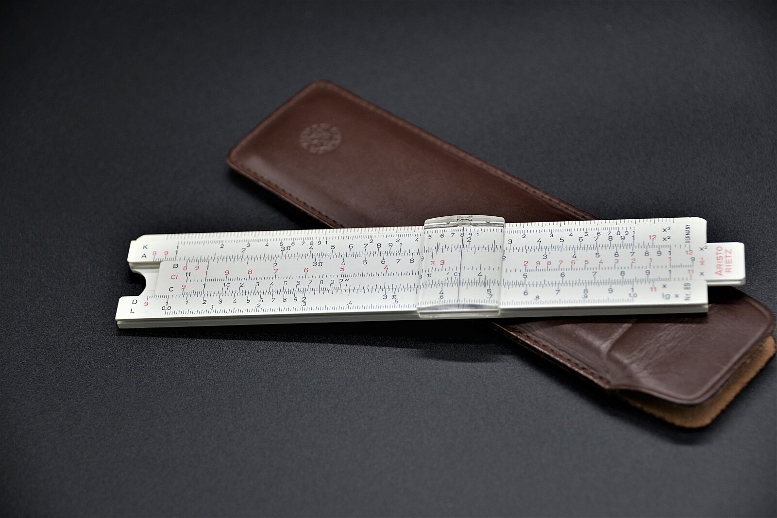 Nikon D610 sample photo. Slide rule, computing device photography