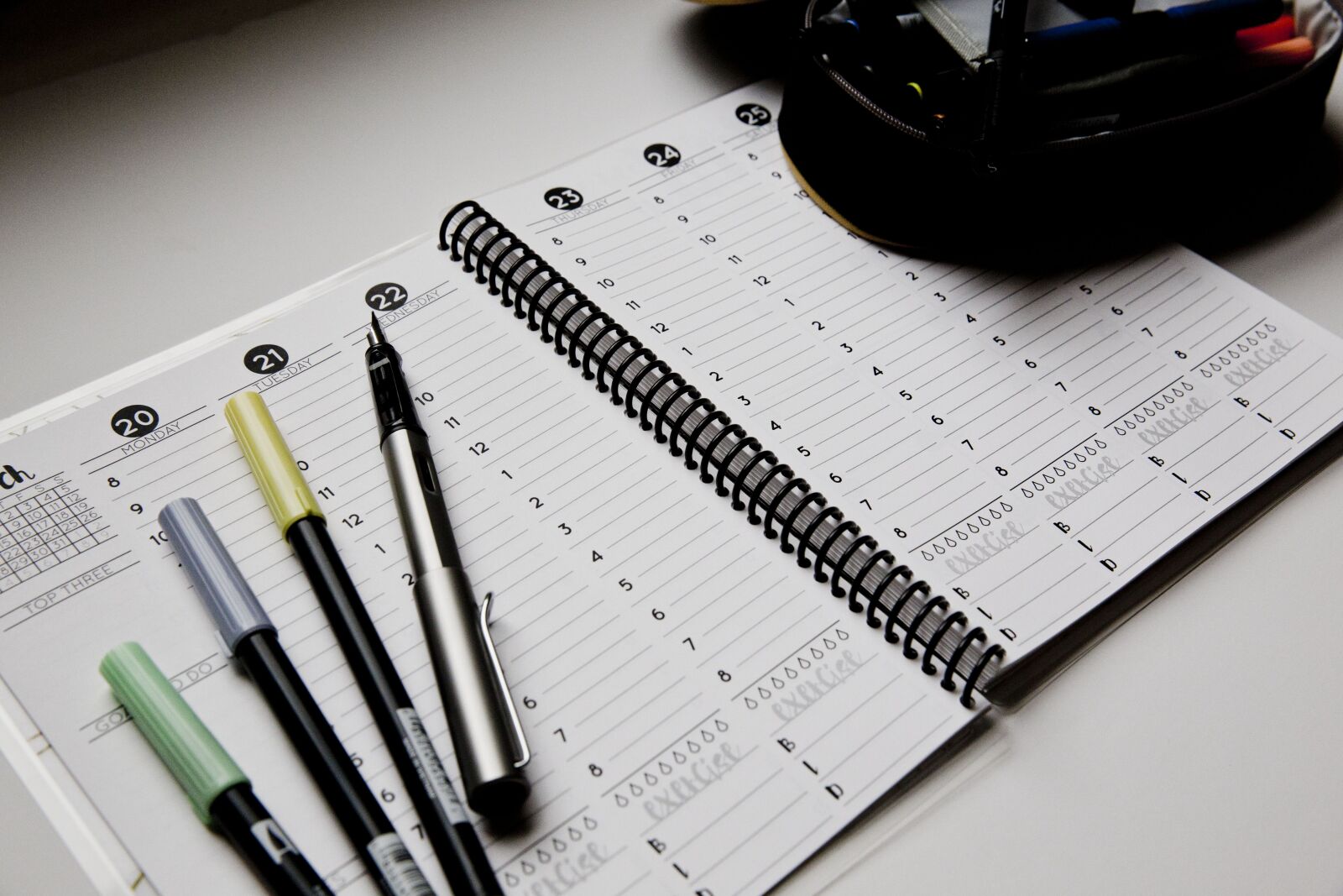 Canon EF 24-70mm F2.8L II USM sample photo. Planner, open, pens photography