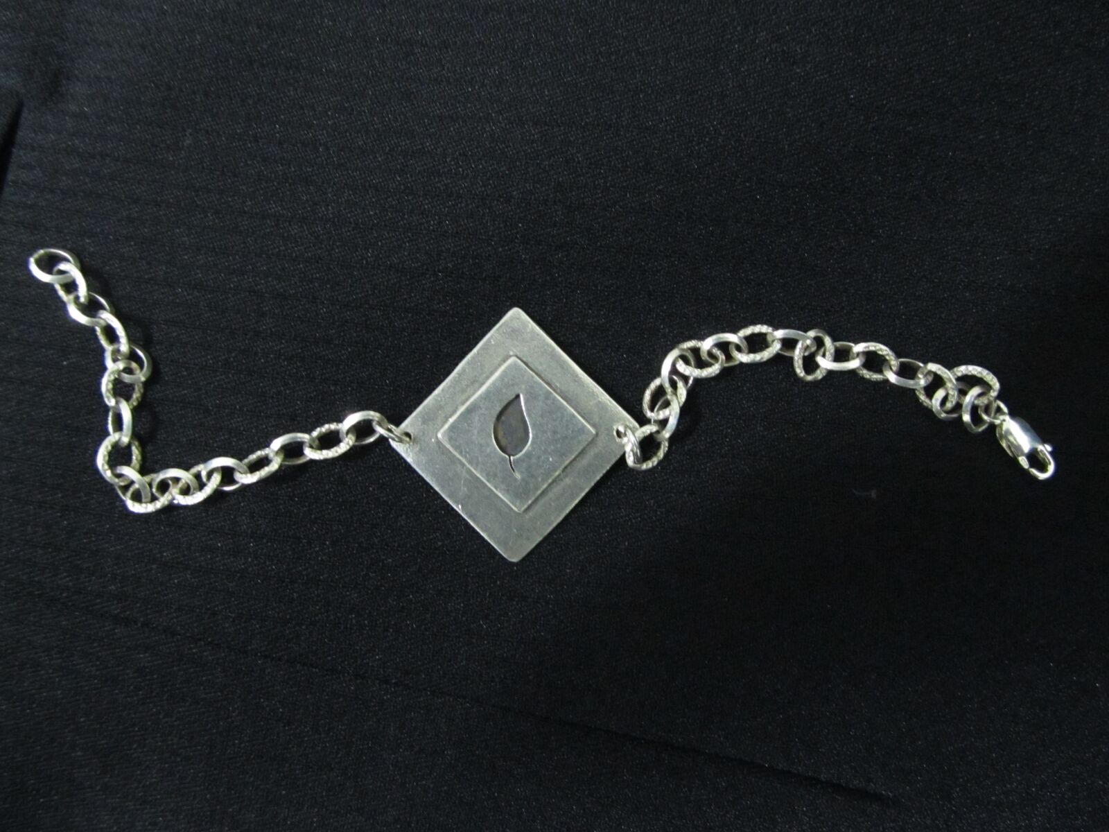 Canon PowerShot SX130 IS sample photo. Bracelet, leaf, handmade hammering photography