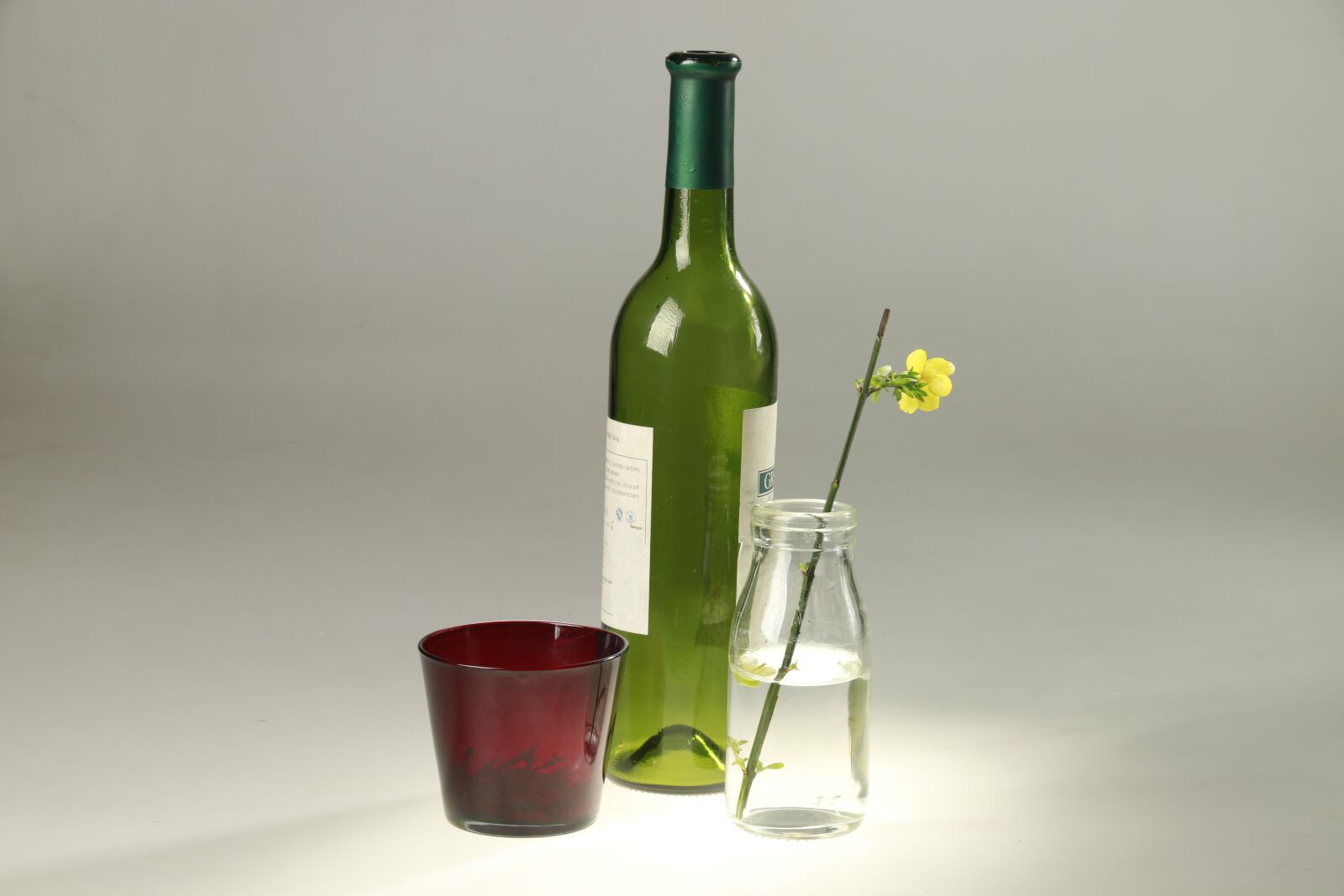 Canon EF-S 18-135mm F3.5-5.6 IS sample photo. Glass, light, bottle photography