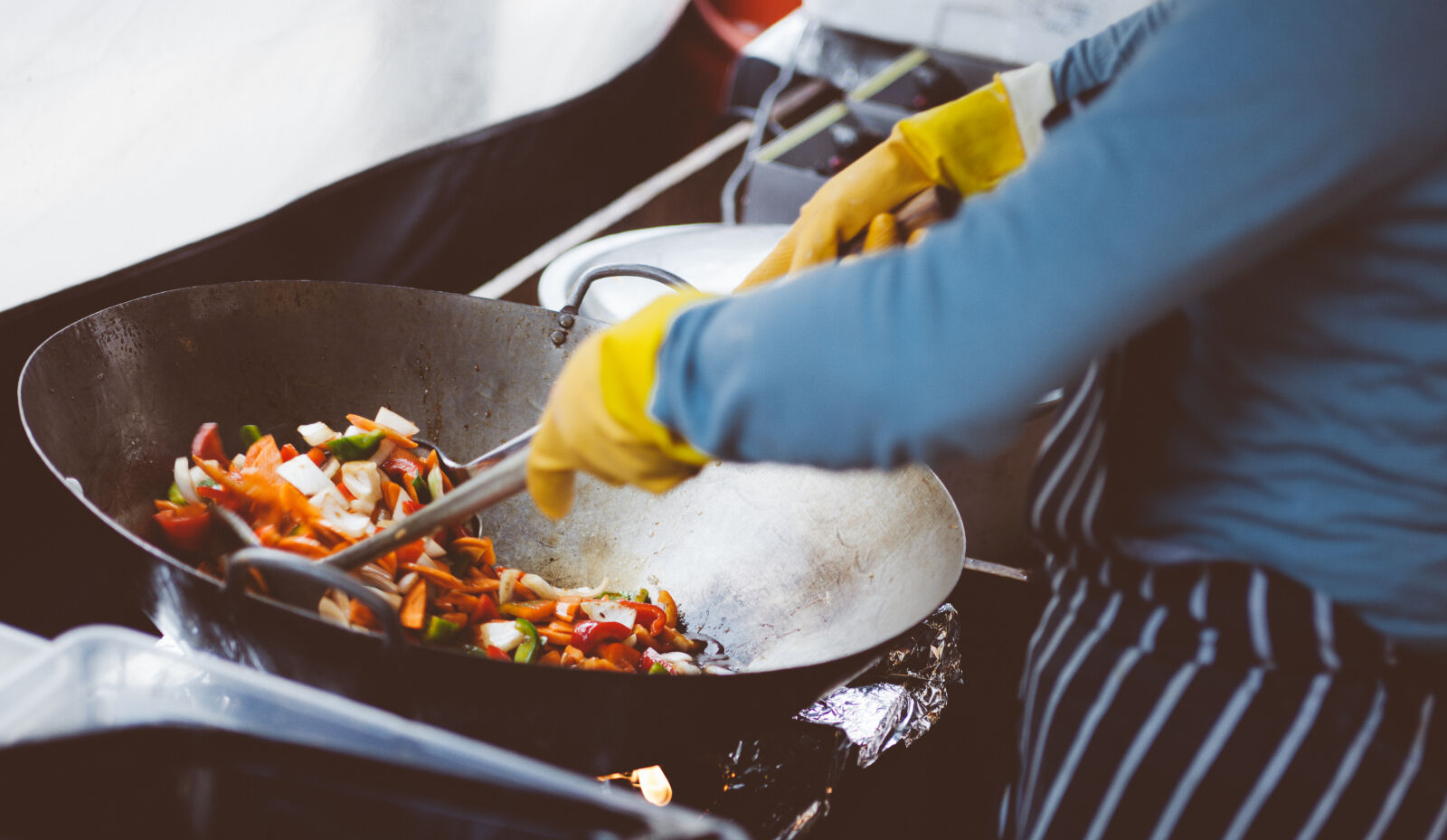 Canon EF 28-70mm f/2.8L USM sample photo. Person, cooking, on, stainless photography