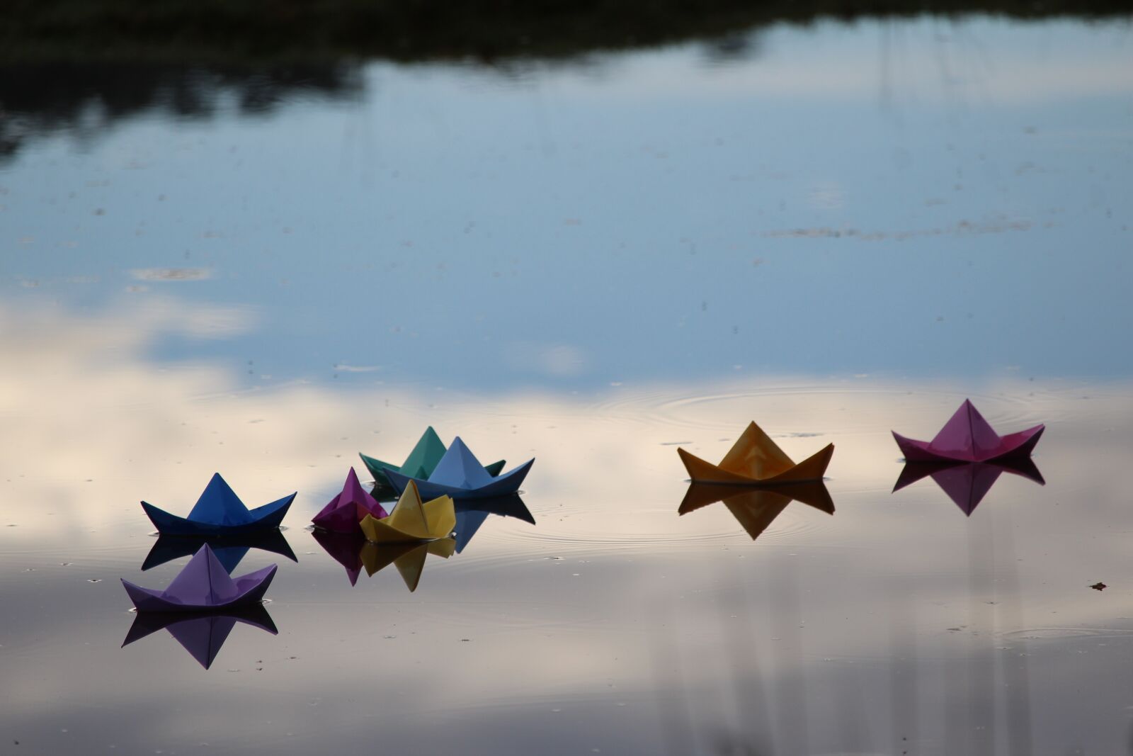 Canon EF-S 55-250mm F4-5.6 IS STM sample photo. Paper, boat, coloured photography