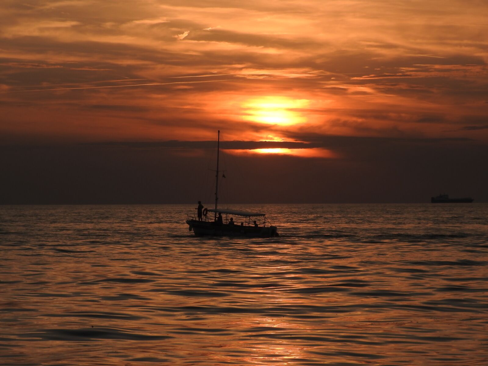 Nikon Coolpix P610 sample photo. Sunset, body of water photography