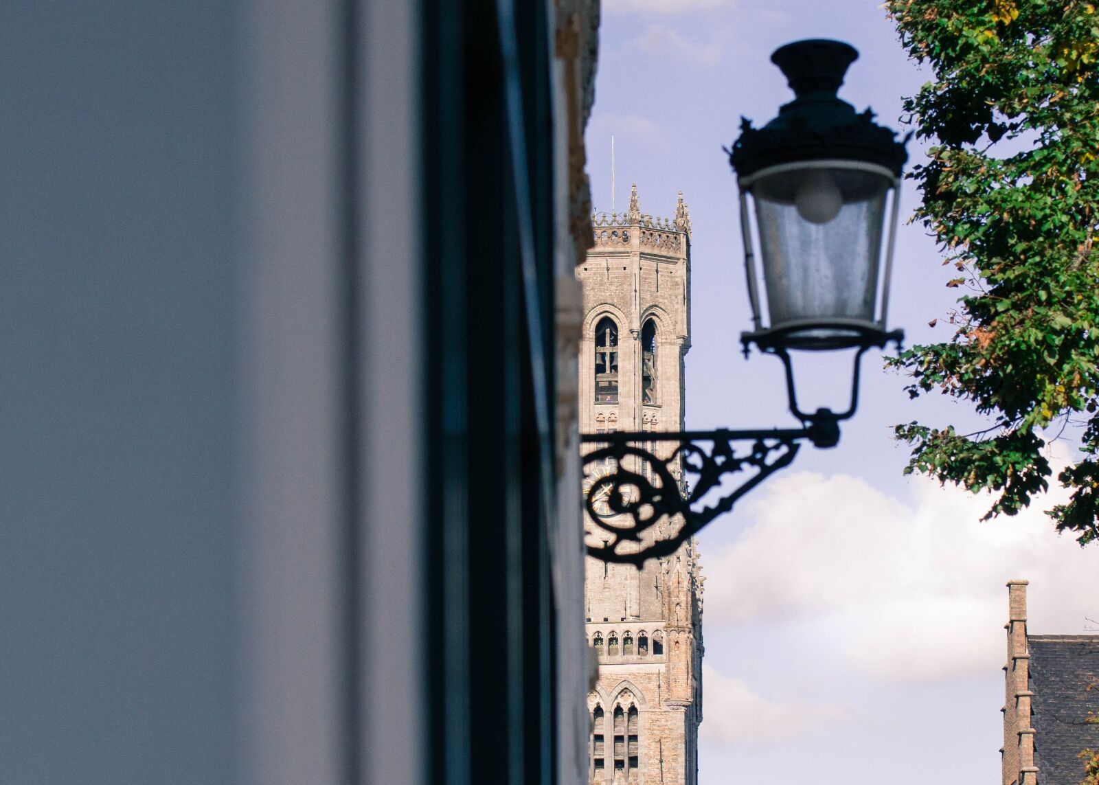 Sony a6000 sample photo. Bruges, belfry, lamp photography