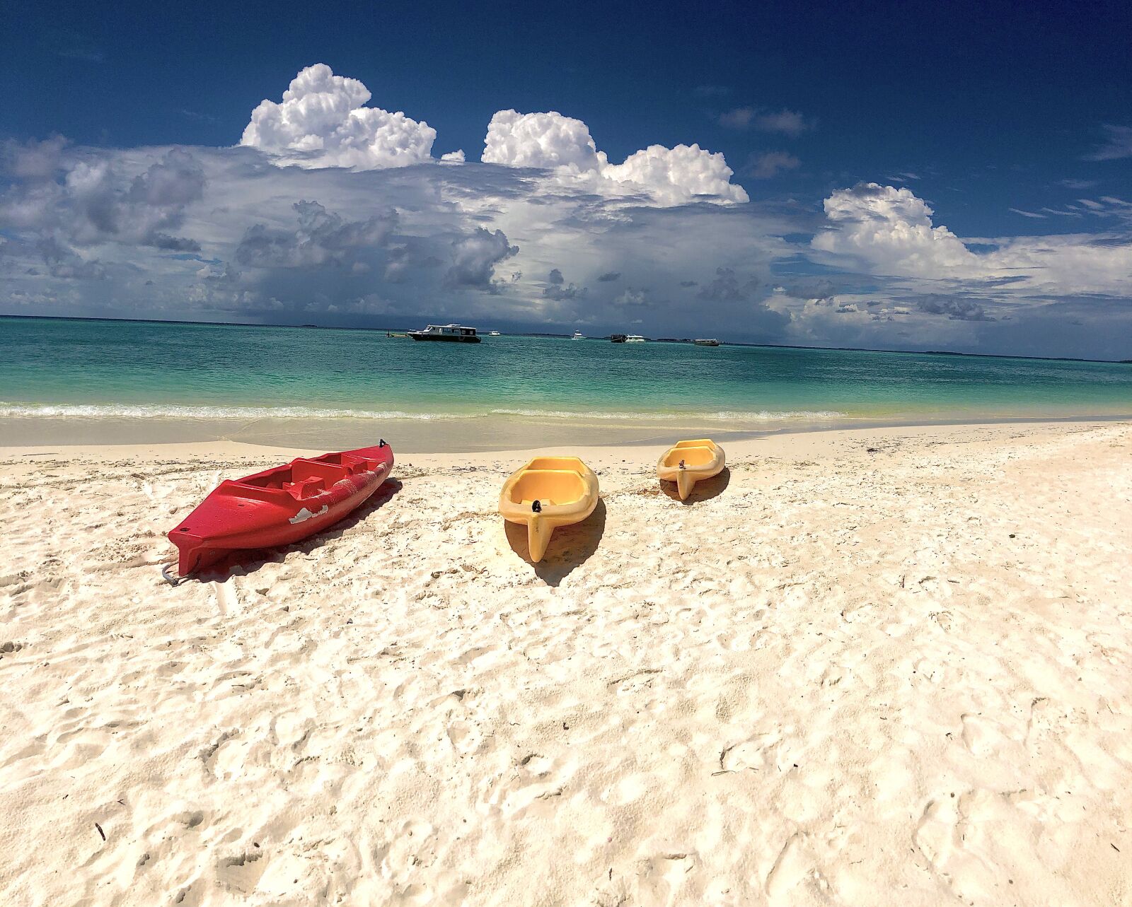 iPhone X back camera 4mm f/1.8 sample photo. Maldives, boats, sea photography