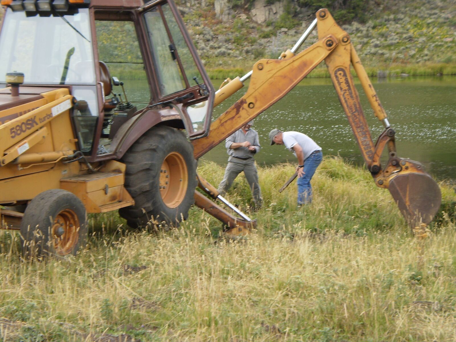 Olympus FE360,X875,C570 sample photo. Backhoe, heavy equipment, construction photography