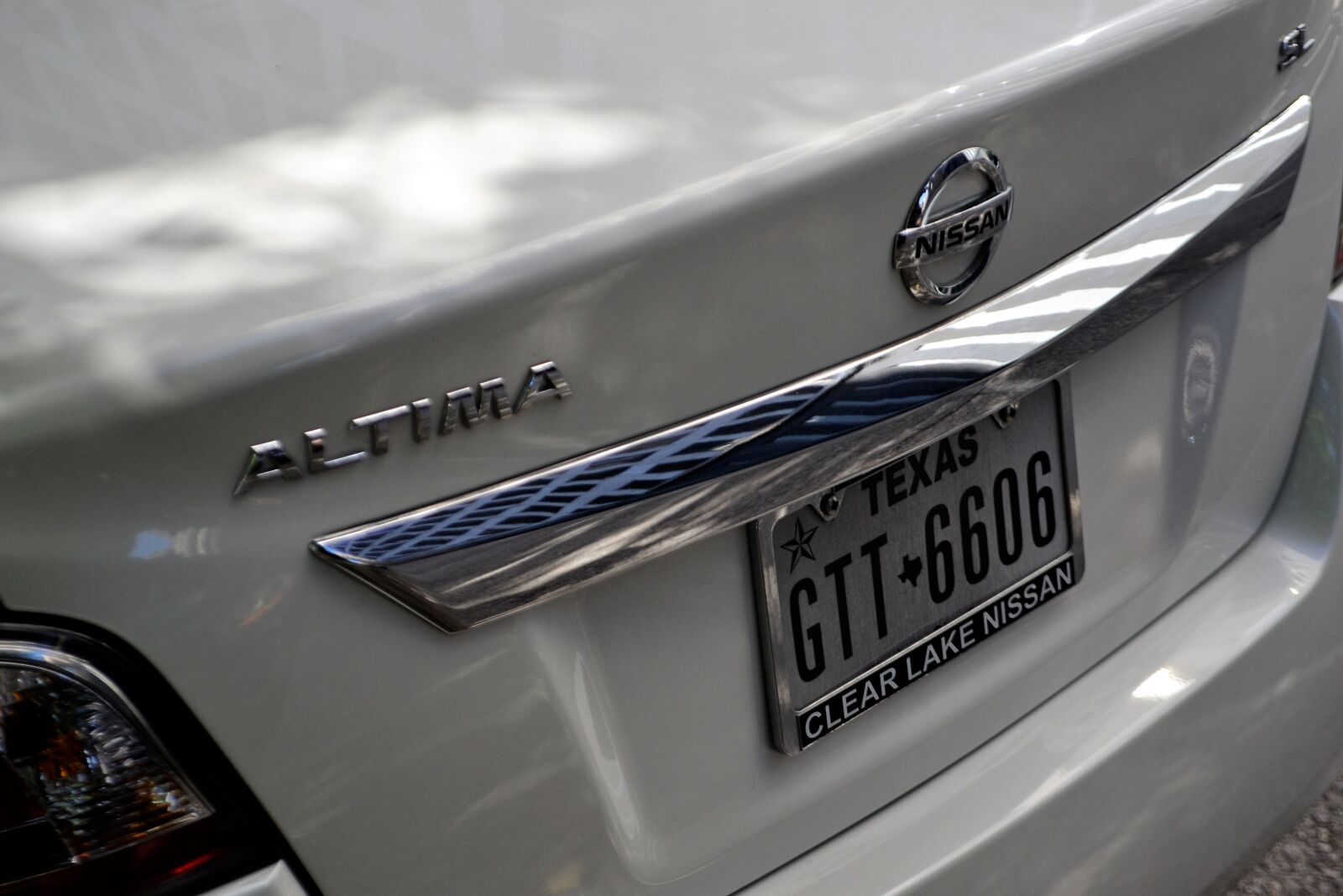 Nikon D3100 sample photo. Nissan altima, white sedan photography