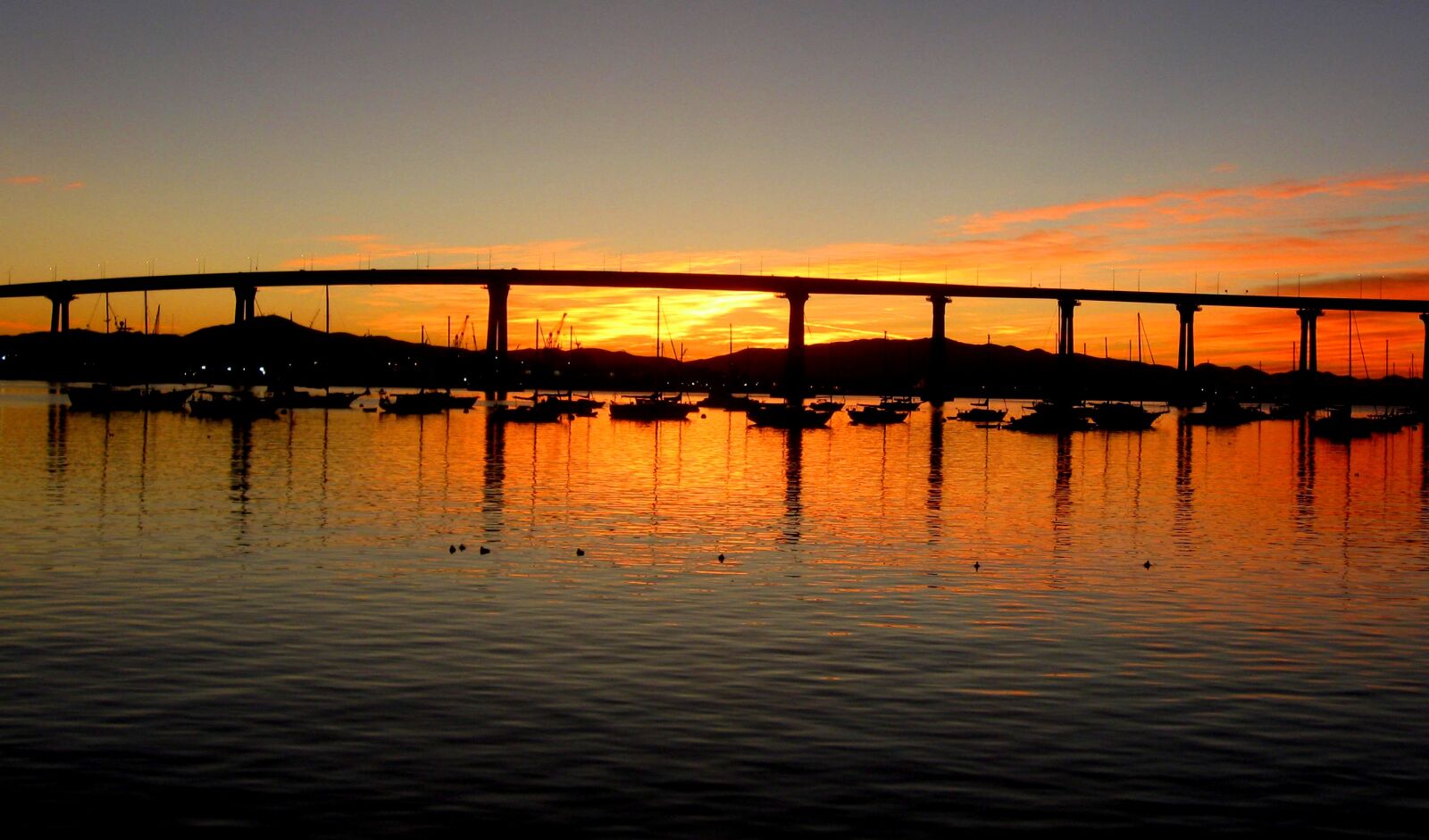 5.8 - 23.2 mm sample photo. Bridge, water, sunrise photography