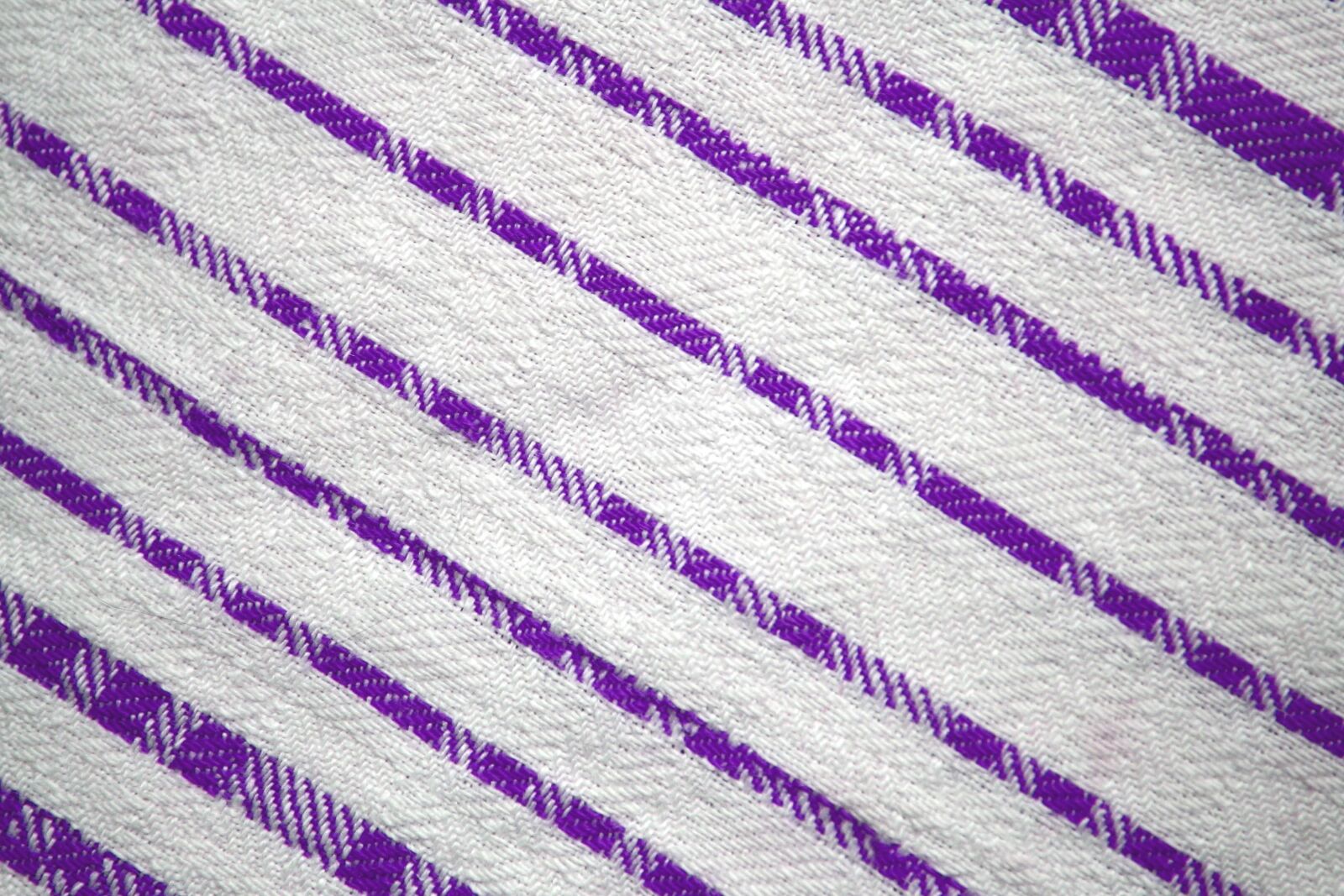 f/3.5-5.6 IS sample photo. Purple colored textil, diagonal photography