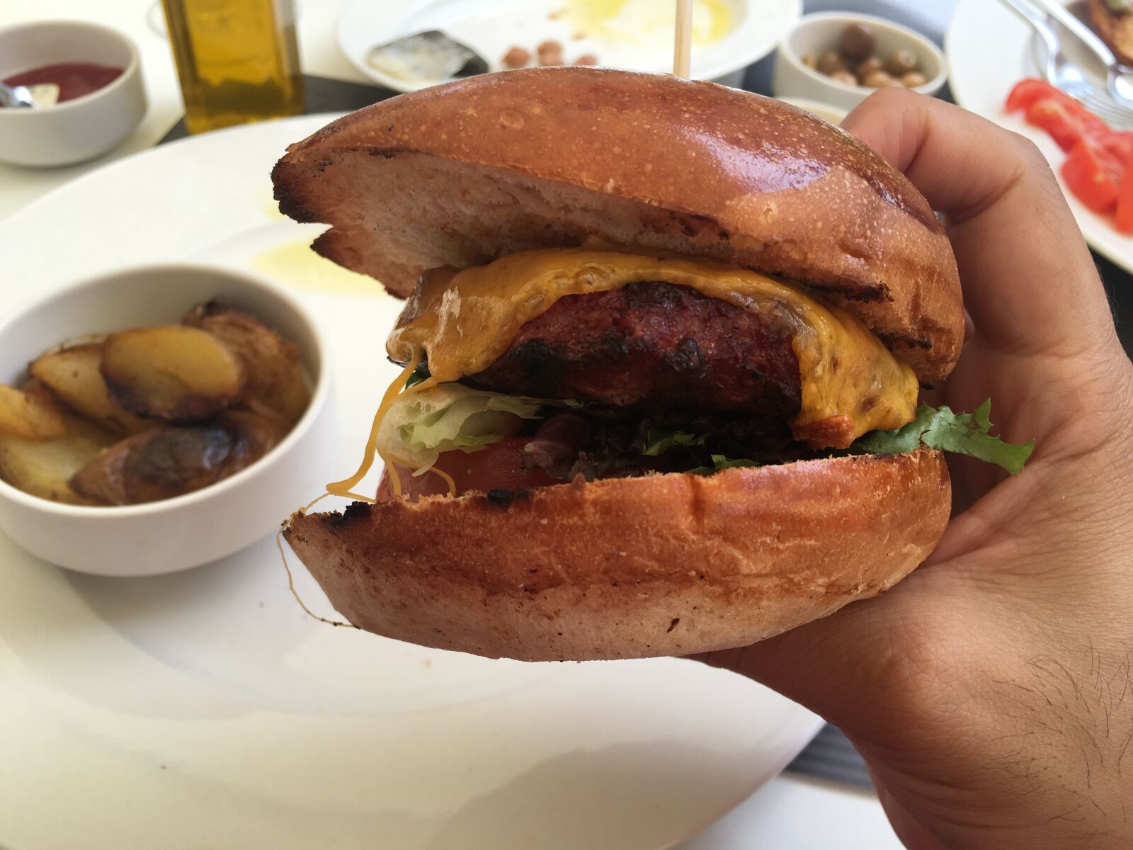 Apple iPhone 6s Plus sample photo. Burger, olives, food photography