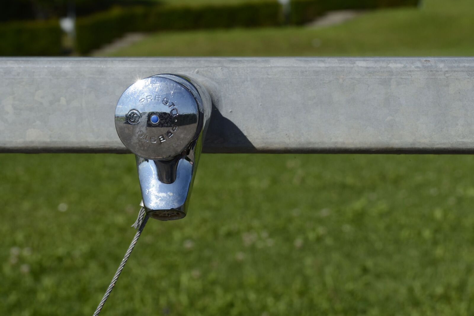 Nikon D7100 sample photo. Faucet, hahn, football pitch photography