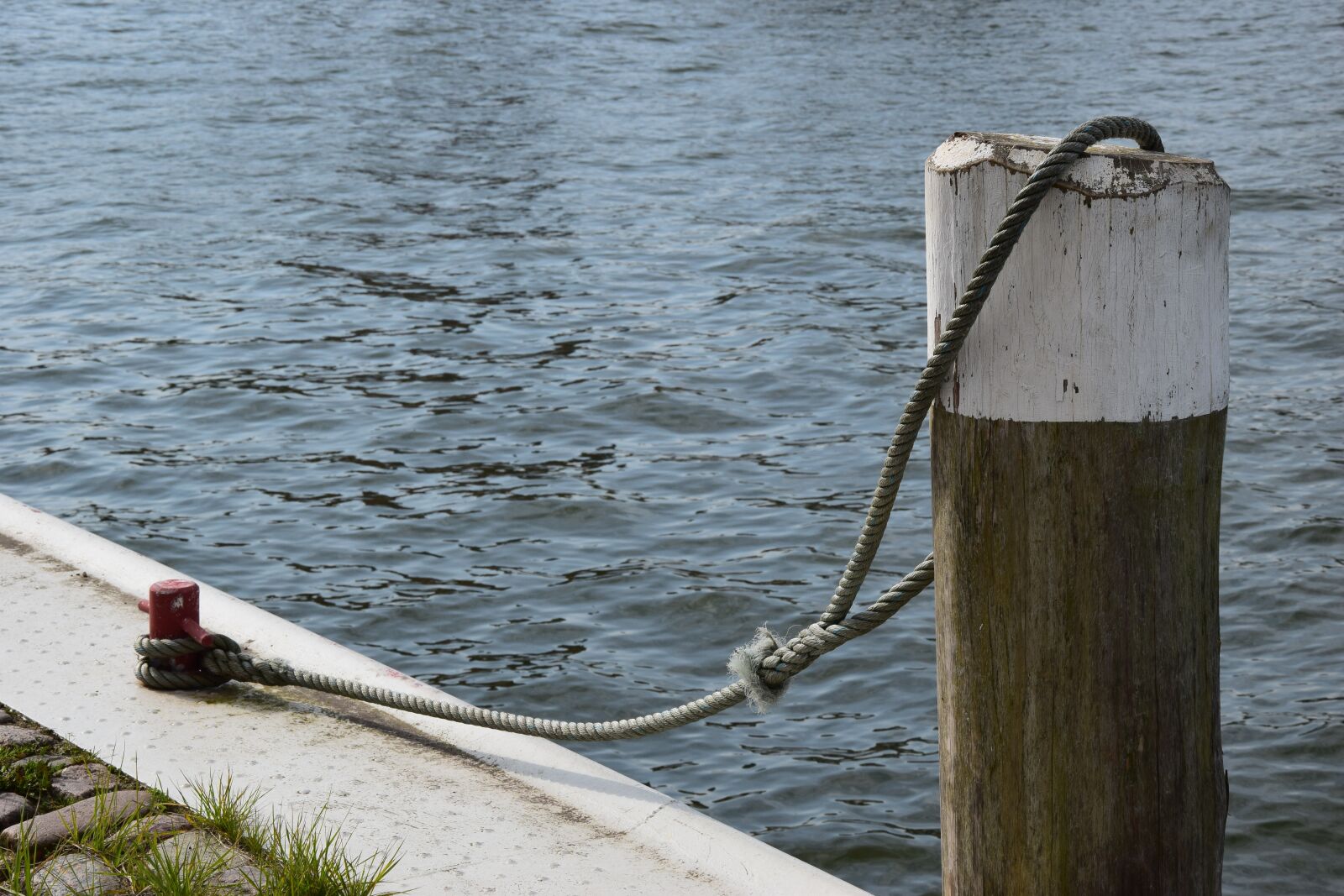 Nikon D3300 sample photo. Water, wood pile, pier photography