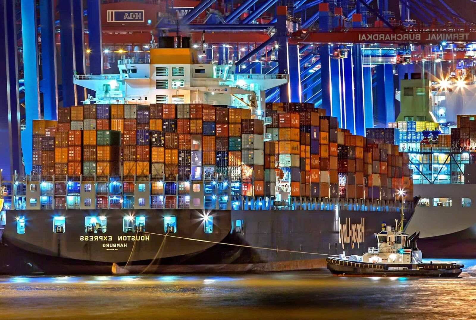 Canon EOS 5D Mark II sample photo. Cargo ship, city, architecture photography