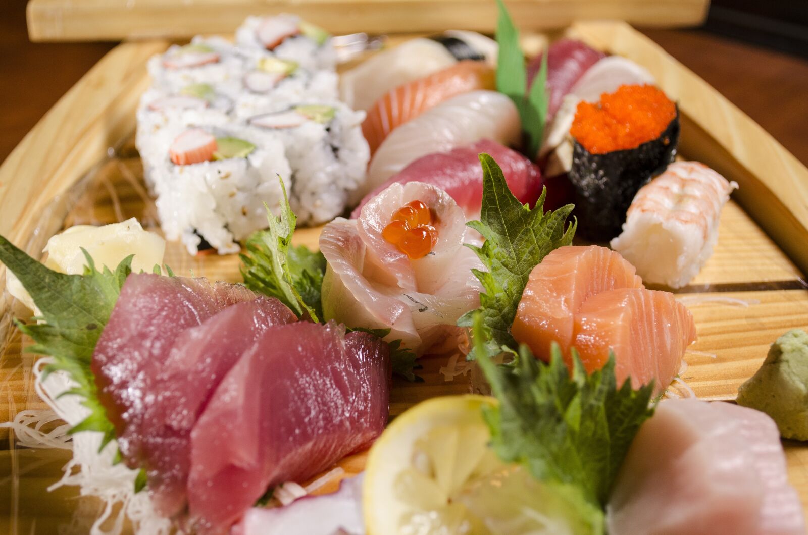 Nikon D5100 sample photo. Sushi boat, japanese sushi photography