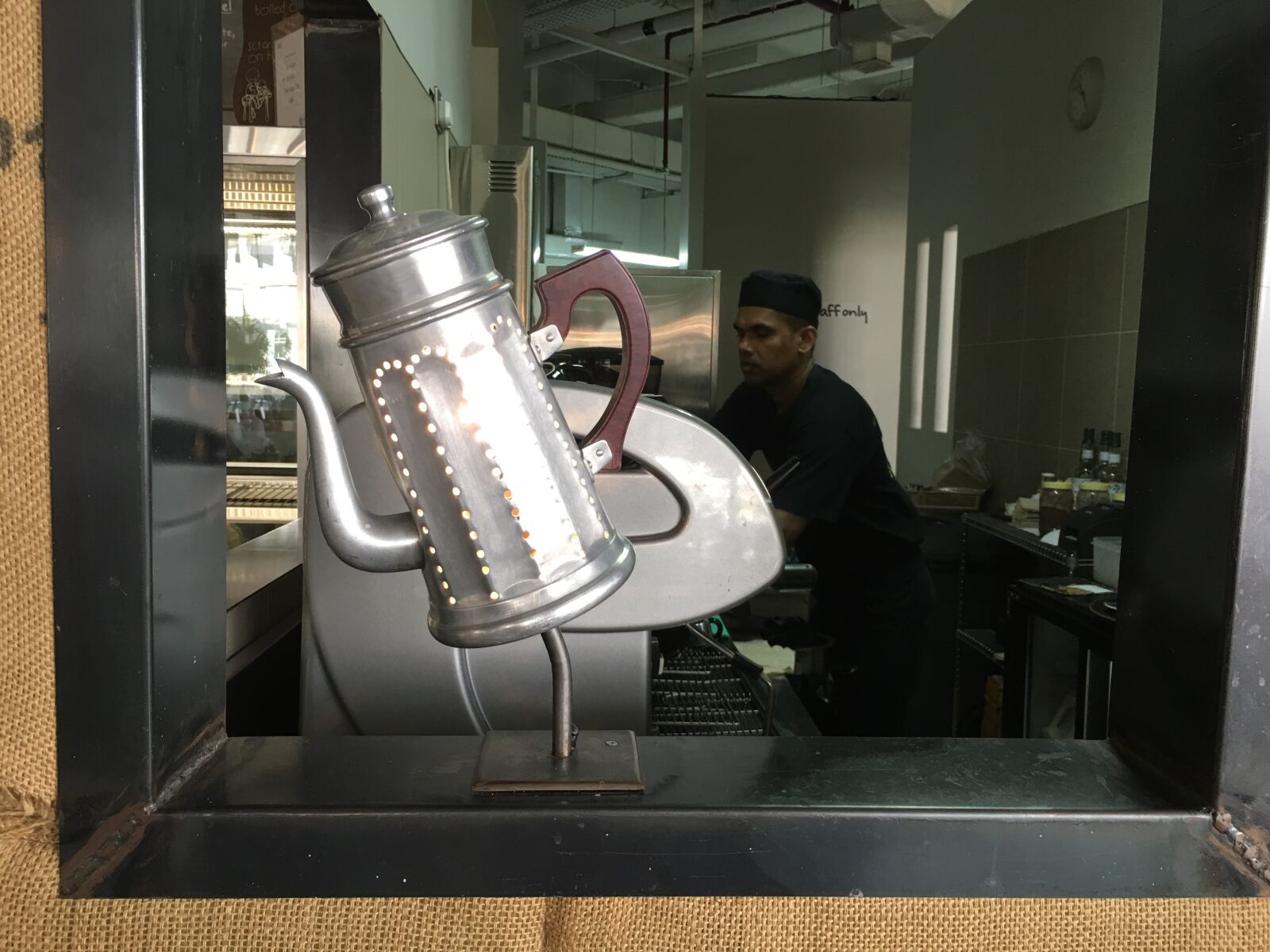 iPhone 6s Plus back camera 4.15mm f/2.2 sample photo. Coffee pot, cafe, biker photography