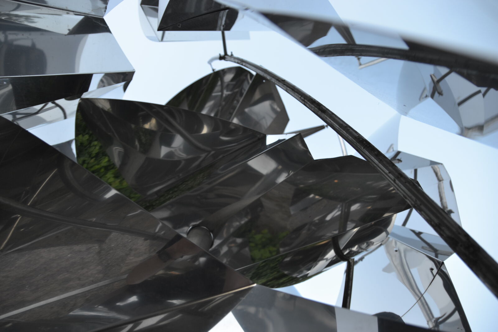 Sigma 17-50mm F2.8 EX DC OS HSM sample photo. Art, reflections, sculpture, metal photography