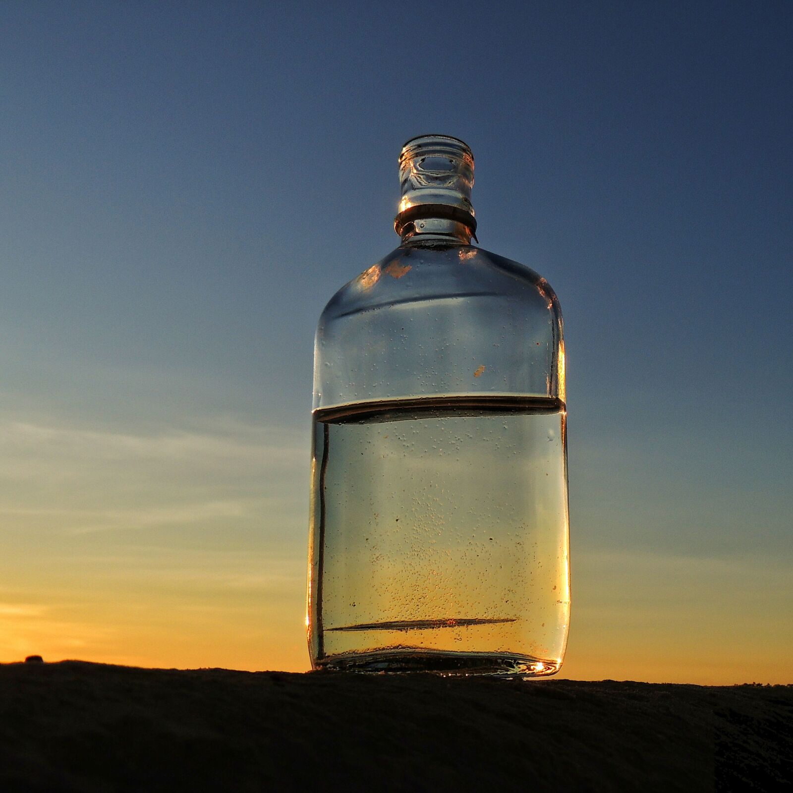 Nikon Coolpix P510 sample photo. Bottle, sunset, horizon photography