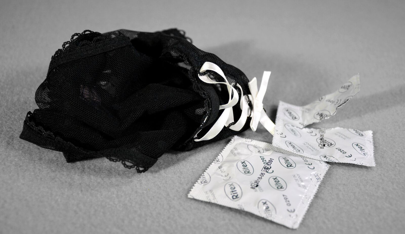 Nikon D5200 sample photo. Sex, condom, slip photography