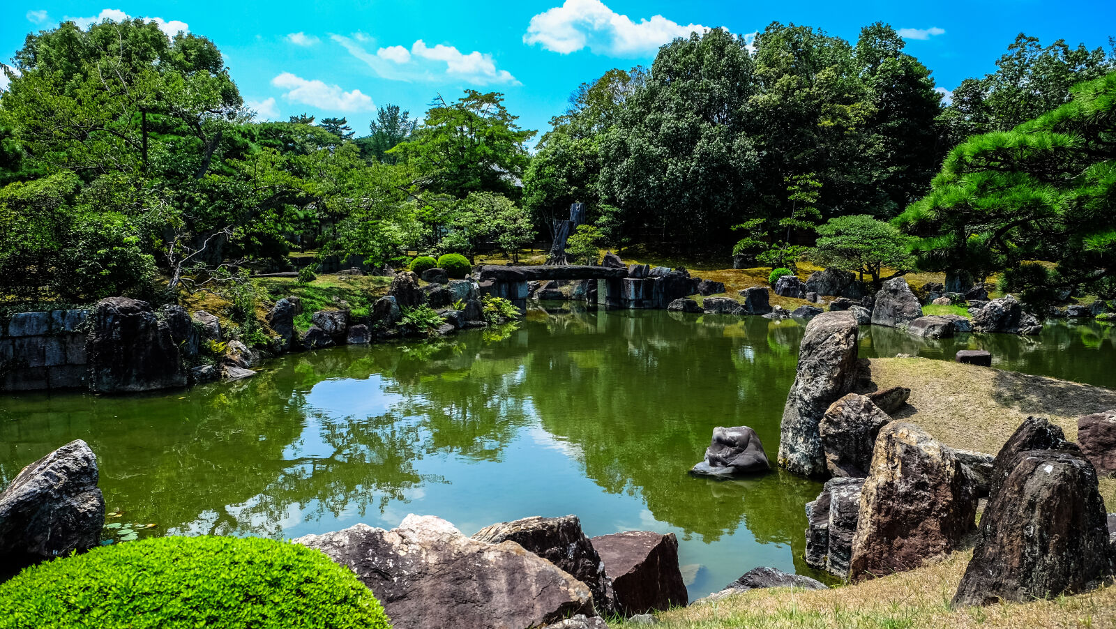 Fujifilm X-E2 sample photo. Bridge, clouds, daylight, garden photography