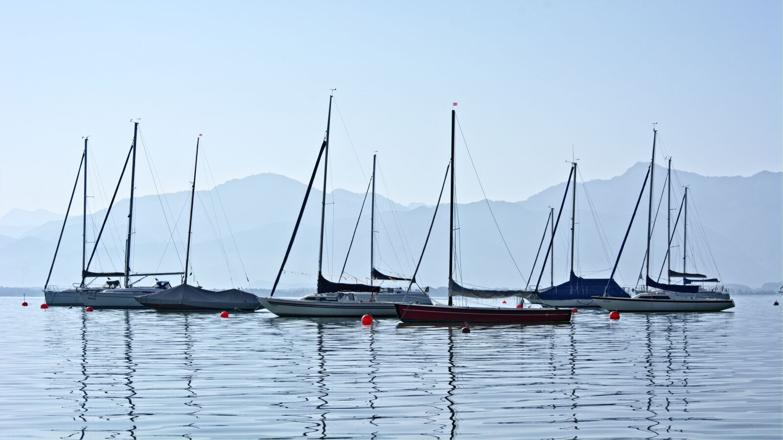 55.0-200.0mm f/4.0-f/5.6 sample photo. Boats, lake, chiemsee photography