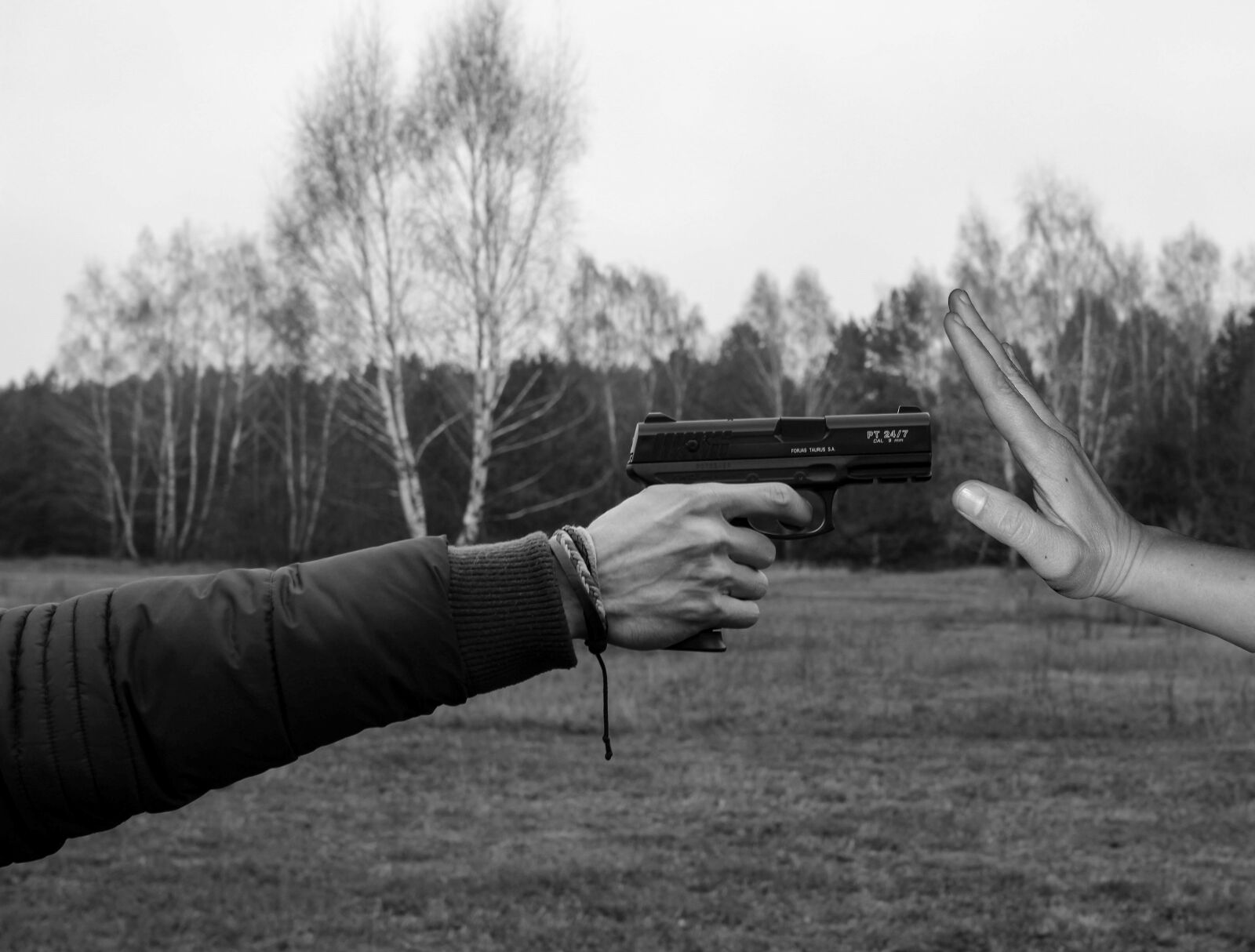 Canon EF-S 24mm F2.8 STM sample photo. Weapon, pistol, shoot photography