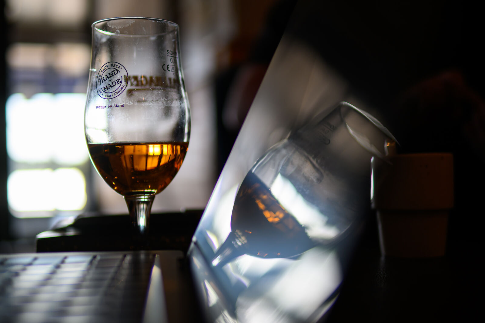 30mm F1.4 DC DN | Contemporary 016 sample photo. Beer glass bokeh reflection photography