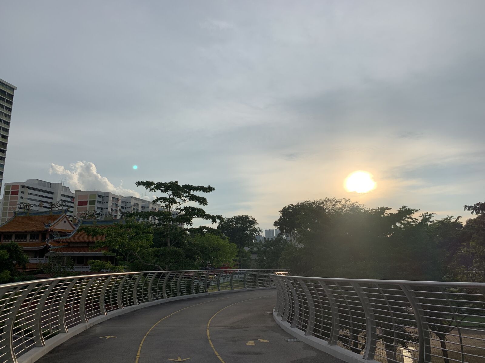 iPhone XS Max back dual camera 4.25mm f/1.8 sample photo. Sunset, jogging, bridge photography