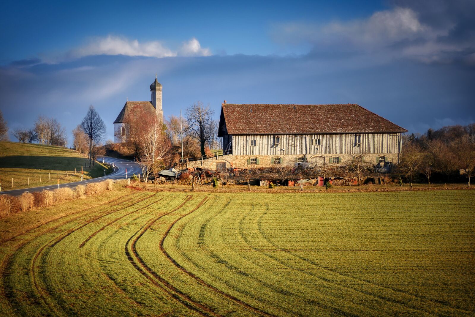 Panasonic Lumix DMC-GX8 sample photo. Church, barn, landscape photography