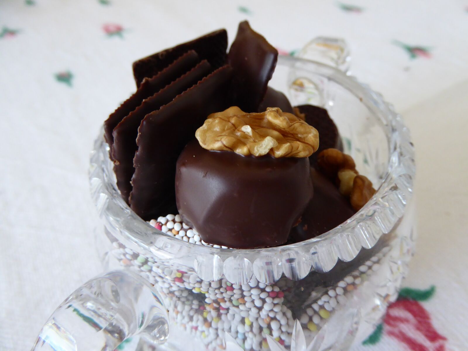 Panasonic DMC-TZ61 sample photo. Chocolates, walnut pralines, glass photography