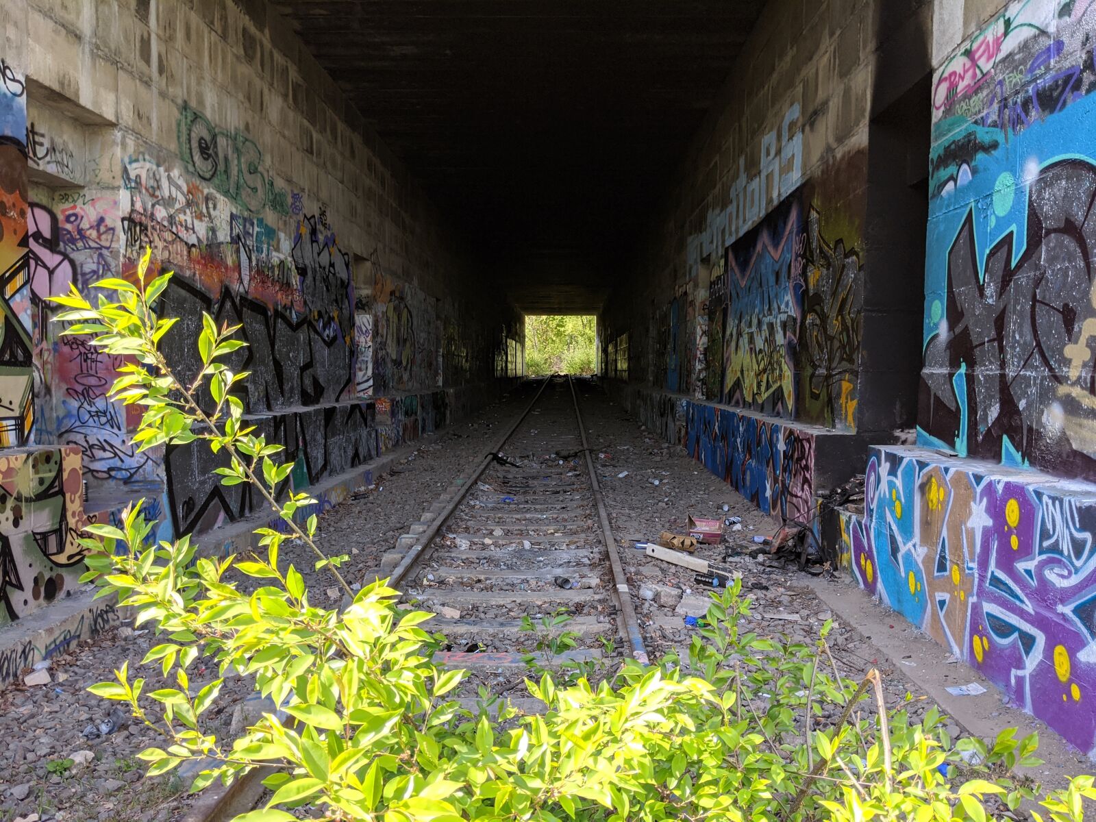 Google Pixel 3a sample photo. Tunnel, rails, train photography