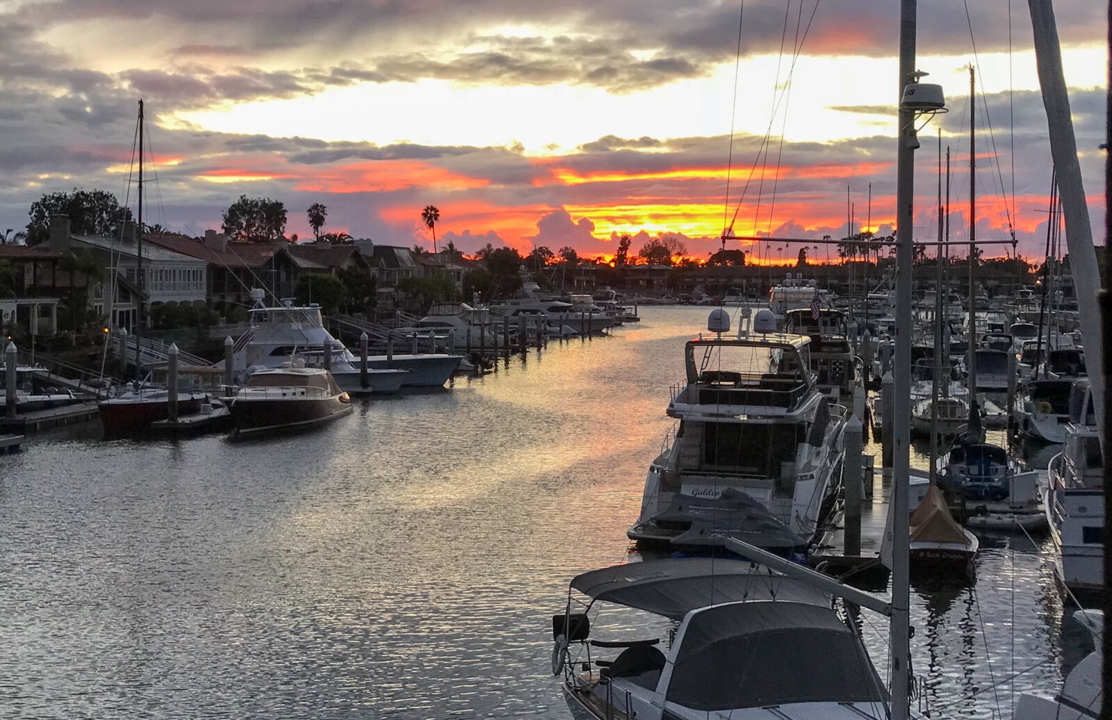 iPhone 7 Plus back dual camera 3.99mm f/1.8 sample photo. Newport coast, yacht, sunset photography